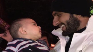 WATCH: Ranveer Singh cuddles a cute little baby in London and it’s absolutely adorable