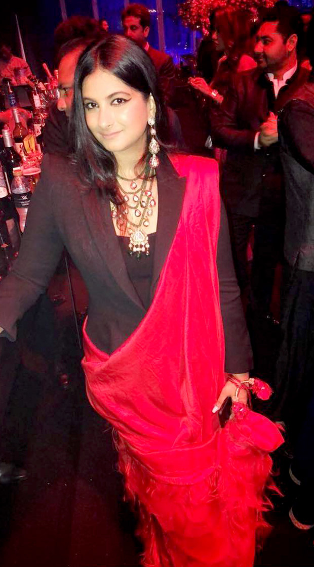 Rhea Kapoor in an Alexander McQueen suit and Anamika Khanna saree at the Mohit Marwah and Antara Motiwala wedding