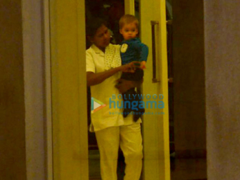 Karan Johar's twins Yash and Roohi snapped at his apartment