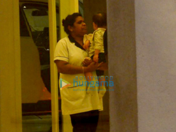 Karan Johar's twins Yash and Roohi snapped at his apartment
