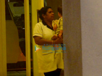 Karan Johar's twins Yash and Roohi snapped at his apartment