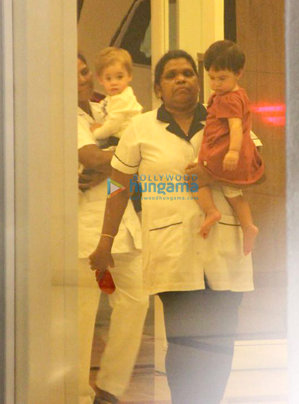 Karan Johar spotted with his kids Yash Johar and Roohi Johar in Bandra Karan Johar spotted with his kids Yash Johar and Roohi Johar in Bandra