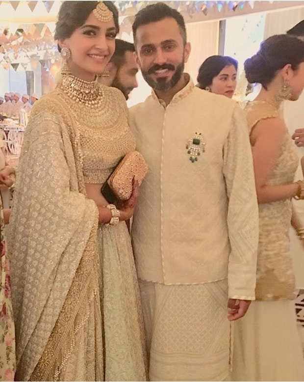 Oo La La!  Sonam Kapoor and Anand Ahuja twin in white, looking spectacular for their mehendi and sangeet ceremony