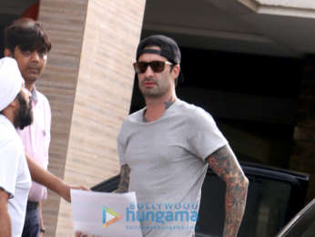 Daniel Weber and Sunny Leone snapped with their daughter at their new apartment in Juhu