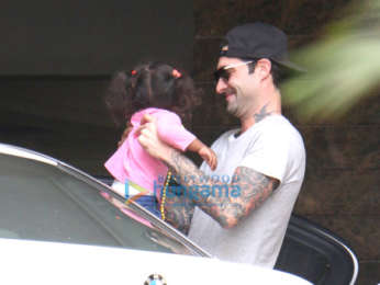 Daniel Weber and Sunny Leone snapped with their daughter at their new apartment in Juhu