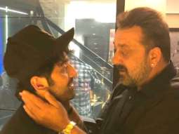 Ranbir Kapoor and Sanjay Dutt caught in a candid moment as they catch up ahead of Sanju release