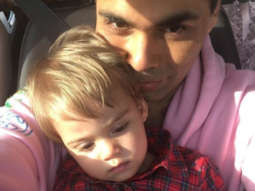 This image of Roohi photo bombing Karan Johar and Yash is simply the cutest