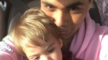 This image of Roohi photo bombing Karan Johar and Yash is simply the cutest