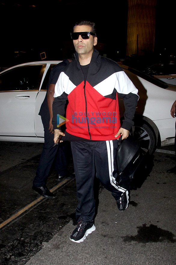 karan johar and evelyn sharma snapped at the airport 1