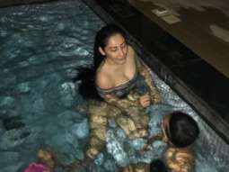 Maanayata Dutt is chilling and relaxing in a pool with kids Iqra and Shahraan