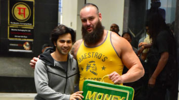 Varun Dhawan flexes his muscles with WWE Superstar Braun Strowman