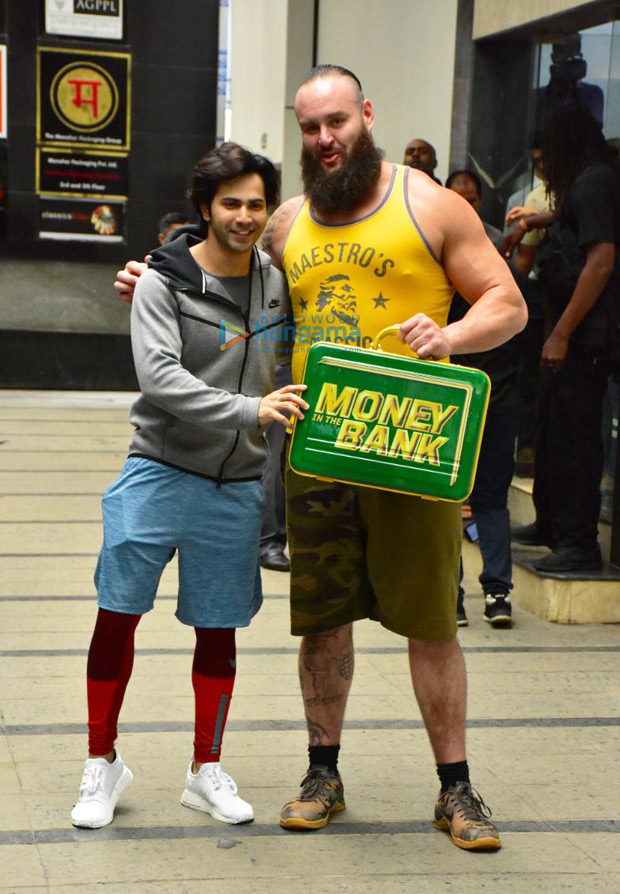 Varun Dhawan flexes his muscles with WWE Superstar Braun Strowman