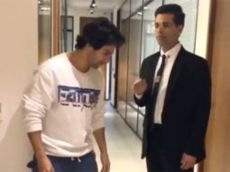 Varun Dhawan gets filmy, touches ‘GURU’ Karan Johar’s feet (see pic)