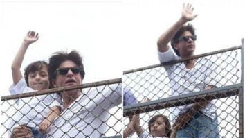 Pics & Video: Shah Rukh Khan and AbRam drive fans crazy after their customary Eid greeting at Mannat
