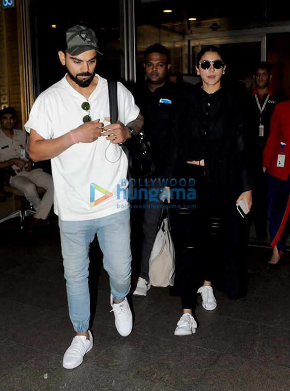 anushka sharma virat kohli and varun dhawan snapped at the airport 2