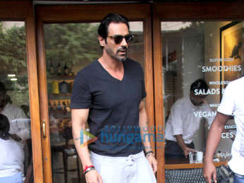 Arjun Rampal and Gabriella Demetriades spotted at Sequel Cafe in Bandra-