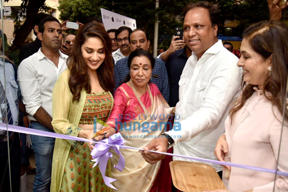 Asha Bhosle and Madhuri Dixit snapped attending the new iPhone launch at Iazure Store Asha Bhosle and Madhuri Dixit snapped attending the new iPhone launch at Iazure Store
