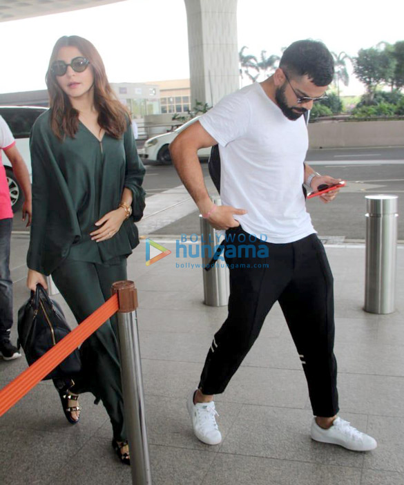 Anushka Sharma, Virat Kohli and Sanjay Kapoor snapped at the airport