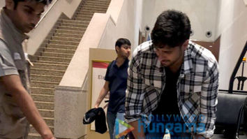 Sidharth Malhotra snapped with Therapy Dogs at the airport