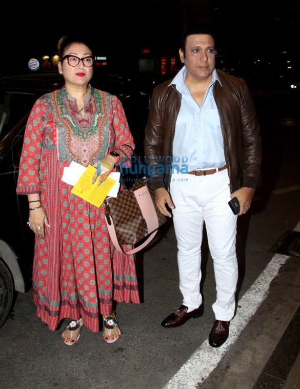 govinda snapped with his wife at the airport 5