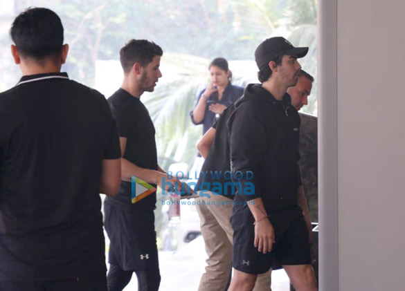joe jonas and nick jonas arrive at a mumbai hotel 3