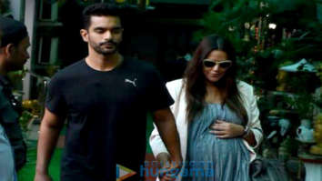 Neha Dhupia and Angad Bedi snapped outside a hospital in Khar