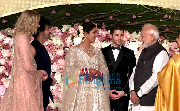 priyanka chopra and nick jonas along with their families snapped at their delhi reception 10