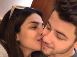 Priyanka Chopra gives a sweet kiss to hubby Nick Jonas as he surpasses The Rock to win GQ’s Most Stylish Man of 2018