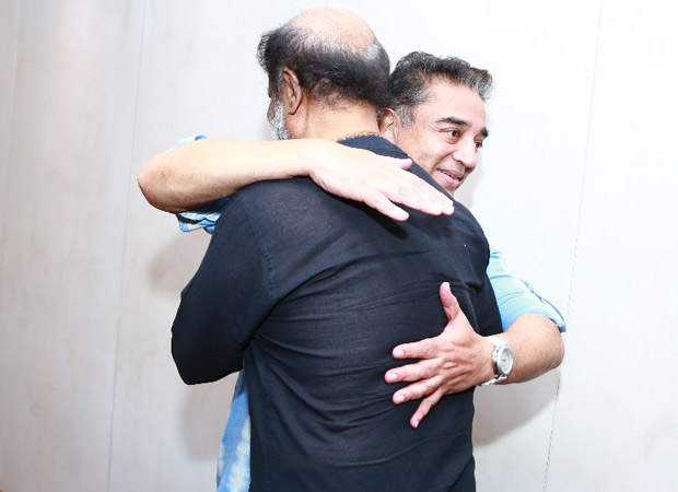 Rajinikanth and Kamal Haasan hug it out in this picture and it makes us wish if they would collaborate soon!