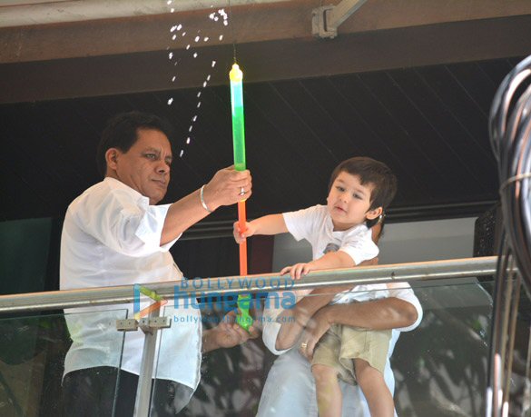 Taimur Ali Khan spotted playing Holi in his balcony Taimur Ali Khan spotted playing Holi in his balcony