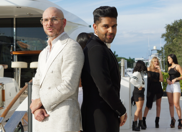 Guru Randhawa and Pitbull come together in T-Series' first international project Slowly Slowly