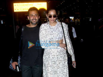 Sonam Kapoor Ahuja, Anand Ahuja and Karan Johar snapped at the airport