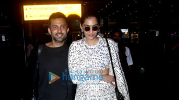 Sonam Kapoor Ahuja, Anand Ahuja, Karan Johar and others snapped at the airport