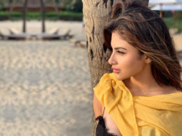 SUMMER SIZZLE: Mouni Roy dips her toes in sand wearing a sexy bralette, reminisces about the latest GOT episode
