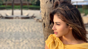 SUMMER SIZZLE: Mouni Roy dips her toes in sand wearing a sexy bralette, reminisces about the latest GOT episode