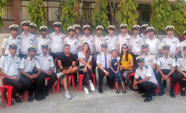 Malang star Disha Patani and director Mohit Suri strike a pose with Merchant Navy students