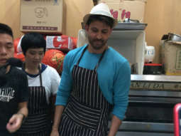 WATCH: Hrithik Roshan makes wheat noodles, serves food to fans at a local restaurant in China