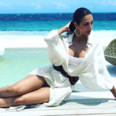 Malaika Arora sizzles in a white shirt dress as she lounges by the pool in Maldives