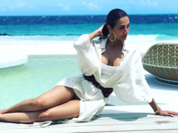 Malaika Arora sizzles in a white shirt dress as she lounges by the pool in Maldives