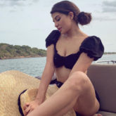 HOT! Jacqueline Fernandez will drive your Monday blues away as she poses in a black bikini on a yacht!