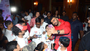 Photos: Arjun Kapoor celebrates ‘National Cancer Rose Day’ with cancer affected children
