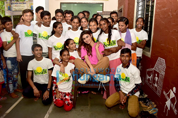 Photos: Mouni Roy snapped at an event with children from Smile Foundation