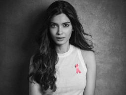 Estée Lauder’s global brand ambassador, Diana Penty, dons a pink ribbon for breast cancer awareness