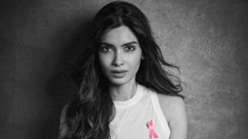 Estée Lauder’s global brand ambassador, Diana Penty, dons a pink ribbon for breast cancer awareness