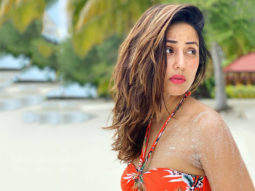 Hina Khan flaunts her perfect body in an orange BIKINI by the beach in Maldives