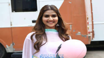 on the sets of the movie Helmet