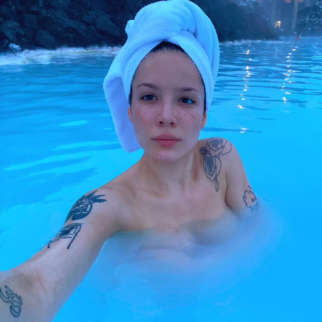 Halsey goes topless and make-up free in this steamy photo, enjoys stress-reducing geothermal spa