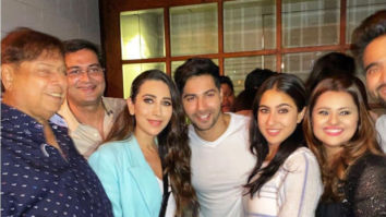 Varun Dhawan and Sara Ali Khan strike a pose with original Coolie No 1 girl Karisma Kapoor at wrap up party