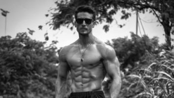 Tiger Shroff flaunts his killer washboard abs in this black and white photo