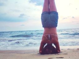 Amala Paul shares pictures of her headstand pose by the beach; calls it a new start